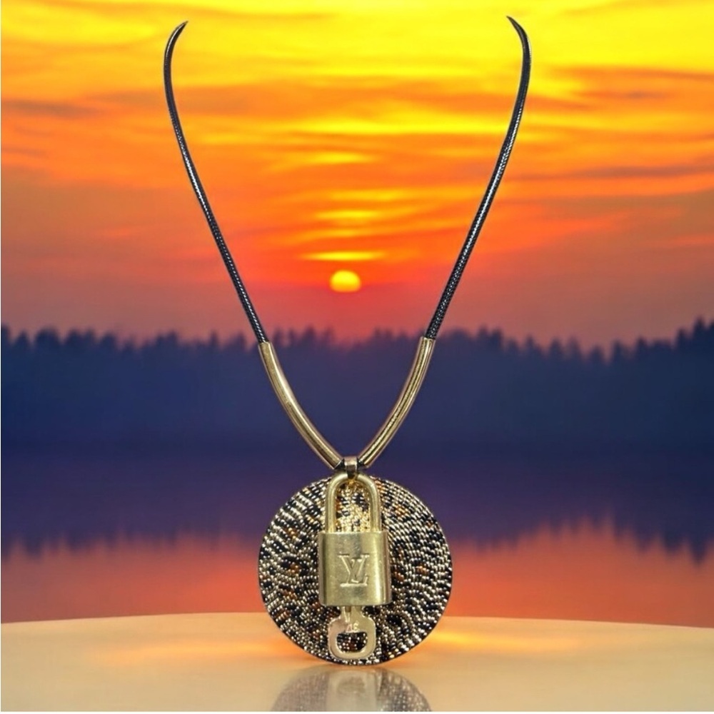Louis Vuitton lock & key #306 on new vibrant, leopard print pendant necklace